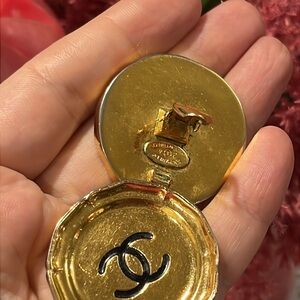 CHANEL Elegant Gold earrings with Black Emblem
